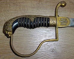 Nazi Army Artillery Officer's Lionhead Sword with Scarcer Riveted Eagle/Swastika Emblem...$485 SOLD