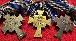 Original Nazi Miniature Mother's Crosses in Gold, Silver and Bronze Finish